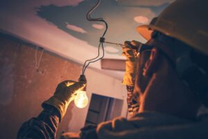 electrician fixing light